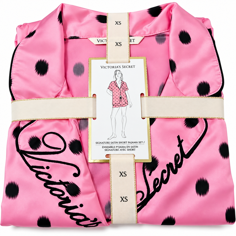 pijama rosa con bolas negras XS